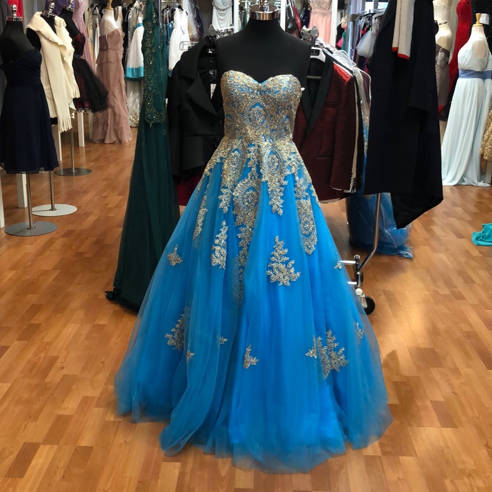 Blue prom or special occasion dress with rhines